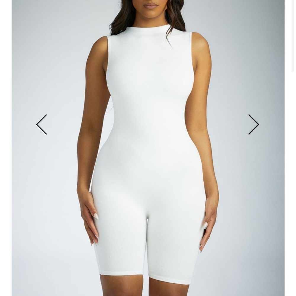 Naked wardrobe romper. Purchased too small